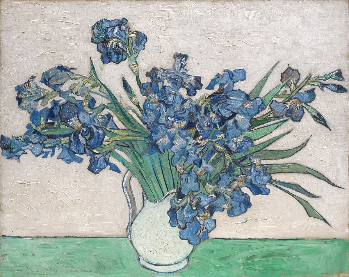A vase of irises with violet-blue flowers against a pale pink field, painted by Vincent van Gogh.